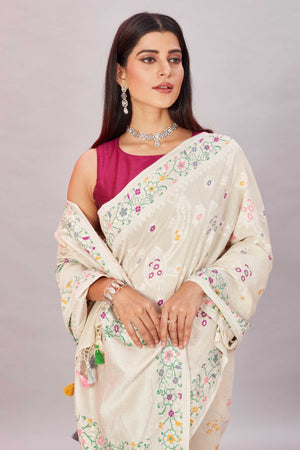 Buy cream tussar Banarasi saree online in USA with zari minakari border. Look your best on festive occasions in latest designer sarees, pure silk sarees, Kanjivaram silk sarees, handwoven saris, tussar silk sarees, embroidered saris from Pure Elegance Indian clothing store in USA.-closeup