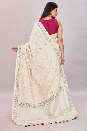 Buy cream tussar Banarasi saree online in USA with zari minakari border. Look your best on festive occasions in latest designer sarees, pure silk sarees, Kanjivaram silk sarees, handwoven saris, tussar silk sarees, embroidered saris from Pure Elegance Indian clothing store in USA.-back