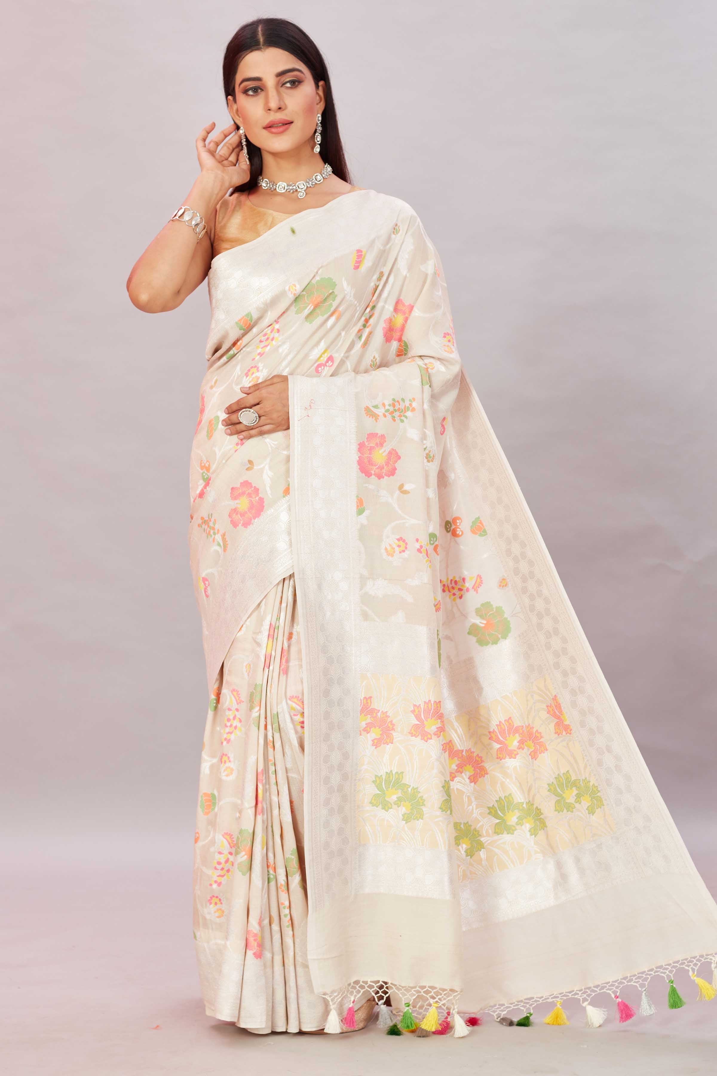 Shop off-white tussar Benarasi sari online in USA with zari minakari floral jaal. Look your best on festive occasions in latest designer sarees, pure silk sarees, Kanjivaram silk sarees, handwoven saris, tussar silk sarees, embroidered saris from Pure Elegance Indian clothing store in USA.-full view