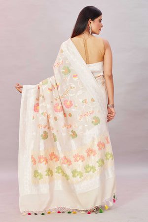 Shop off-white tussar Benarasi sari online in USA with zari minakari floral jaal. Look your best on festive occasions in latest designer sarees, pure silk sarees, Kanjivaram silk sarees, handwoven saris, tussar silk sarees, embroidered saris from Pure Elegance Indian clothing store in USA.-back