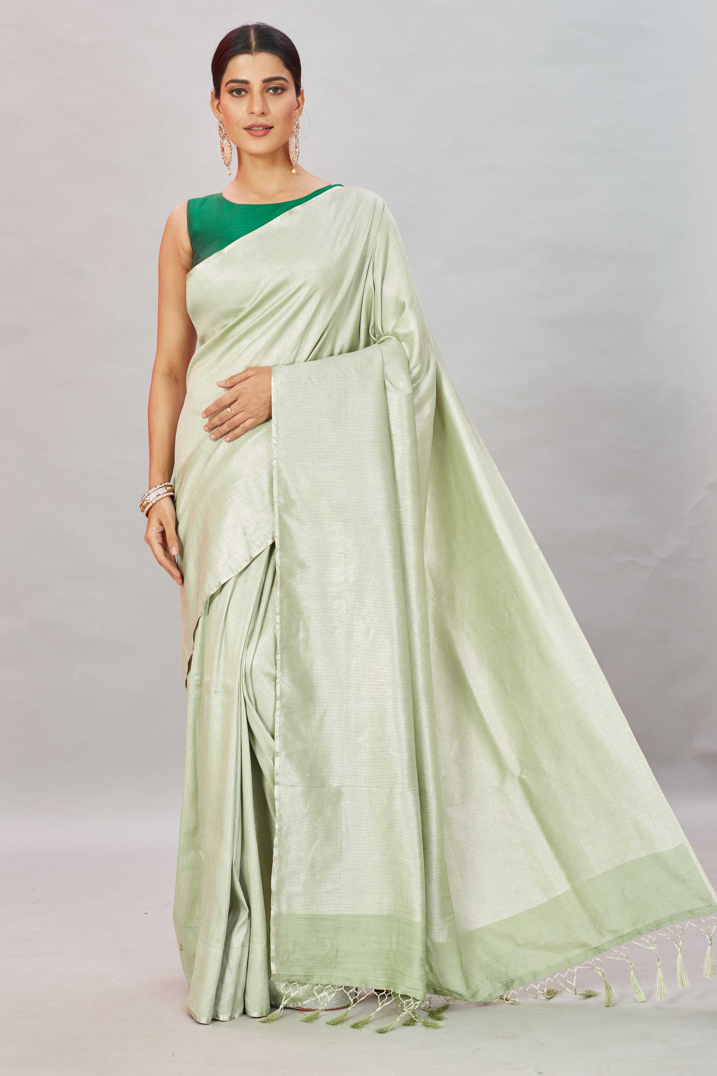 Buy Pistachio green zari stripes Muga Banarasi sari online in USA. Look your best on festive occasions in latest designer saris, pure silk sarees, Kanjivaram silk sarees, handwoven saris, tussar silk sarees, embroidered saris from Pure Elegance Indian clothing store in USA.-full view