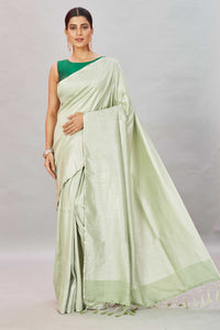 Buy Pistachio green zari stripes Muga Banarasi sari online in USA. Look your best on festive occasions in latest designer saris, pure silk sarees, Kanjivaram silk sarees, handwoven saris, tussar silk sarees, embroidered saris from Pure Elegance Indian clothing store in USA.-full view