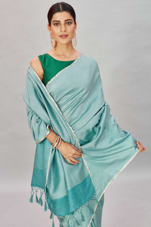 Shop green zari stripes Muga Banarasi sari online in USA. Look your best on festive occasions in latest designer saris, pure silk sarees, Kanjivaram silk sarees, handwoven saris, tussar silk sarees, embroidered saris from Pure Elegance Indian clothing store in USA.-closeup