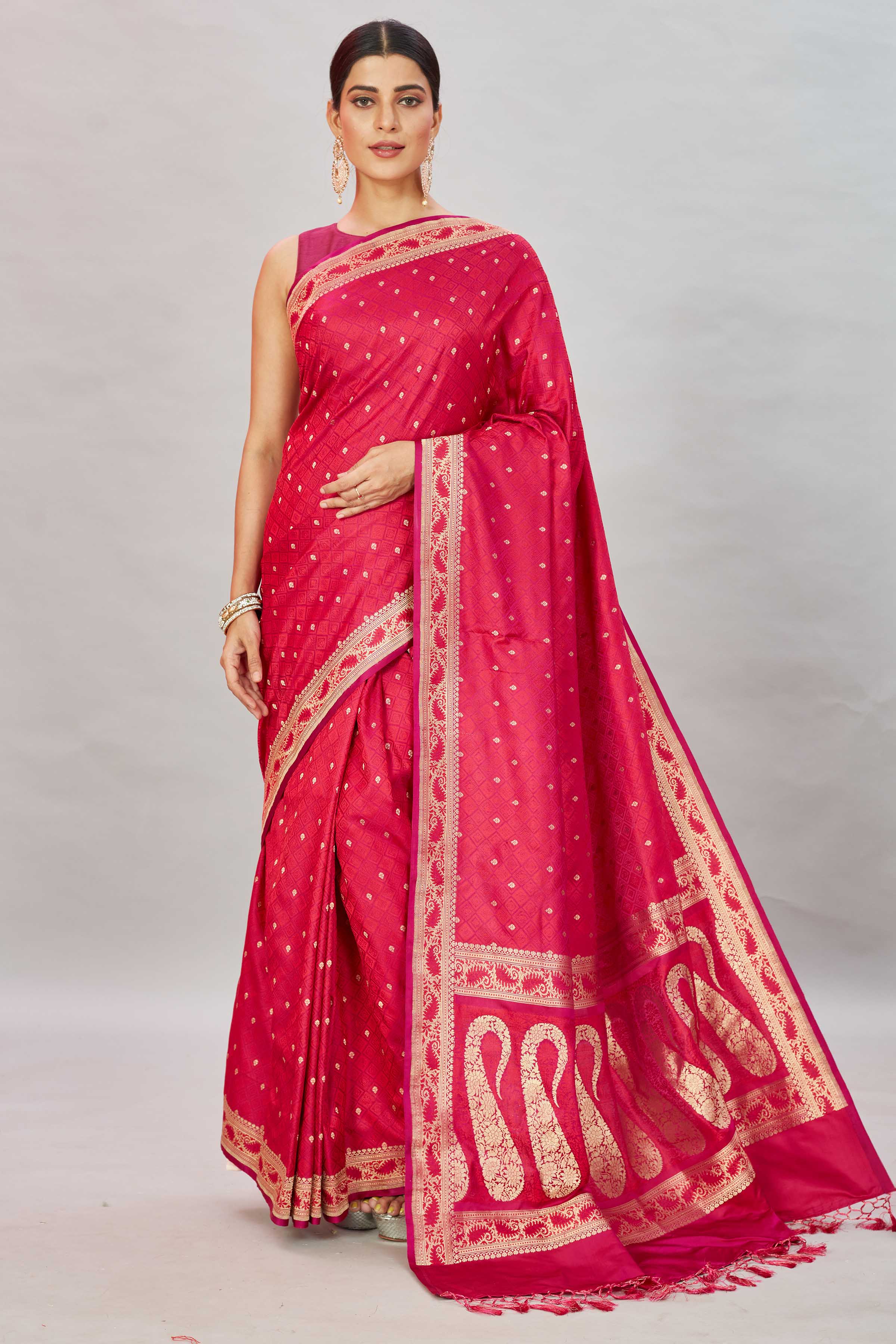 Buy beautiful pink Tanchoi Banarasi saree online in USA with zari buti and border. Look your best on festive occasions in latest designer saris, pure silk sarees, Kanjivaram silk sarees, handwoven saris, tussar silk sarees, embroidered sarees from Pure Elegance Indian clothing store in USA.-full view