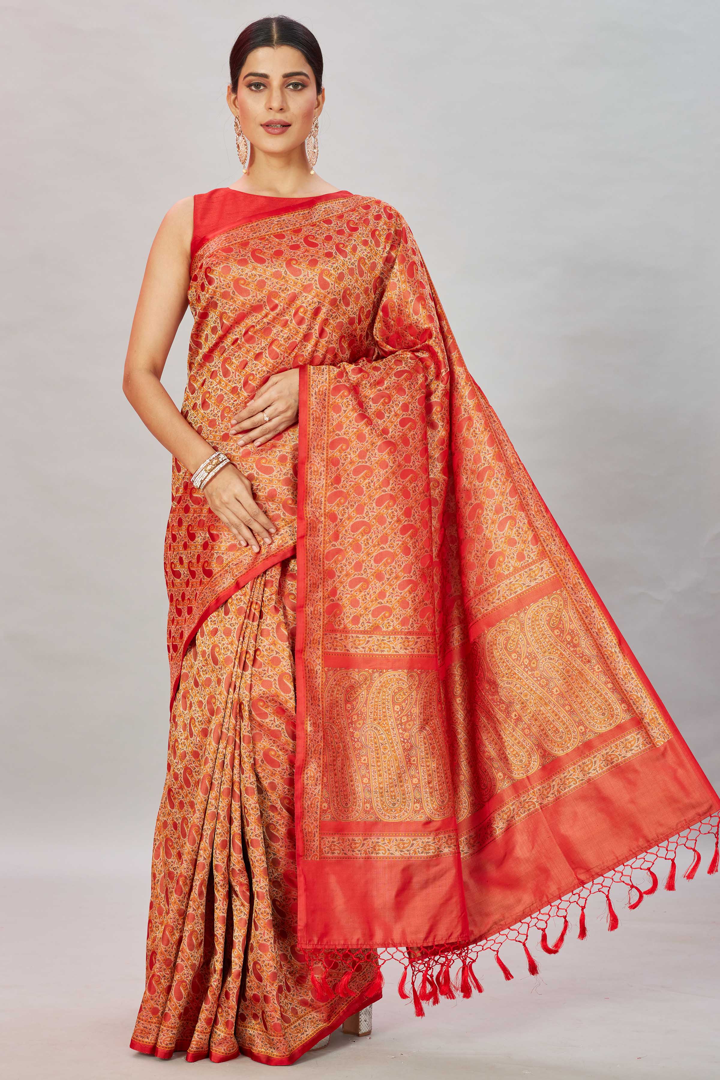 Buy red Tanchoi silk sari online in USA with buti and zari border. Look your best on festive occasions in latest designer saris, pure silk sarees, Kanjivaram silk sarees, handwoven saris, tussar silk sarees, embroidered sarees from Pure Elegance Indian clothing store in USA.-front