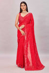 Buy red sequin georgette sari online in USA with embroidered blouse. Look your best on festive occasions in latest designer saris, pure silk sarees, Kanjivaram silk sarees, handwoven saris, tussar silk sarees, embroidered saris from Pure Elegance Indian clothing store in USA.-full view