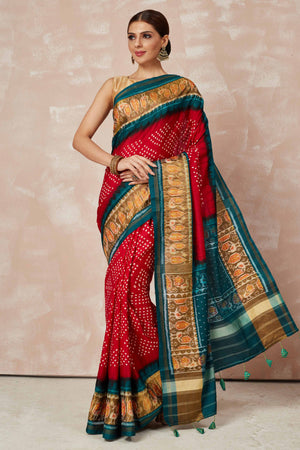 Buy red Patola bandhej saree online in USA with brown green border. Look your best on festive occasions in latest designer sarees, pure silk sarees, Kanjivaram silk saris, handwoven saris, tussar silk sarees, embroidered saris from Pure Elegance Indian clothing store in USA.-front