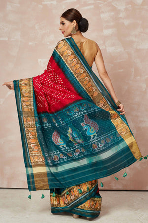 Buy red Patola bandhej saree online in USA with brown green border. Look your best on festive occasions in latest designer sarees, pure silk sarees, Kanjivaram silk saris, handwoven saris, tussar silk sarees, embroidered saris from Pure Elegance Indian clothing store in USA.-back