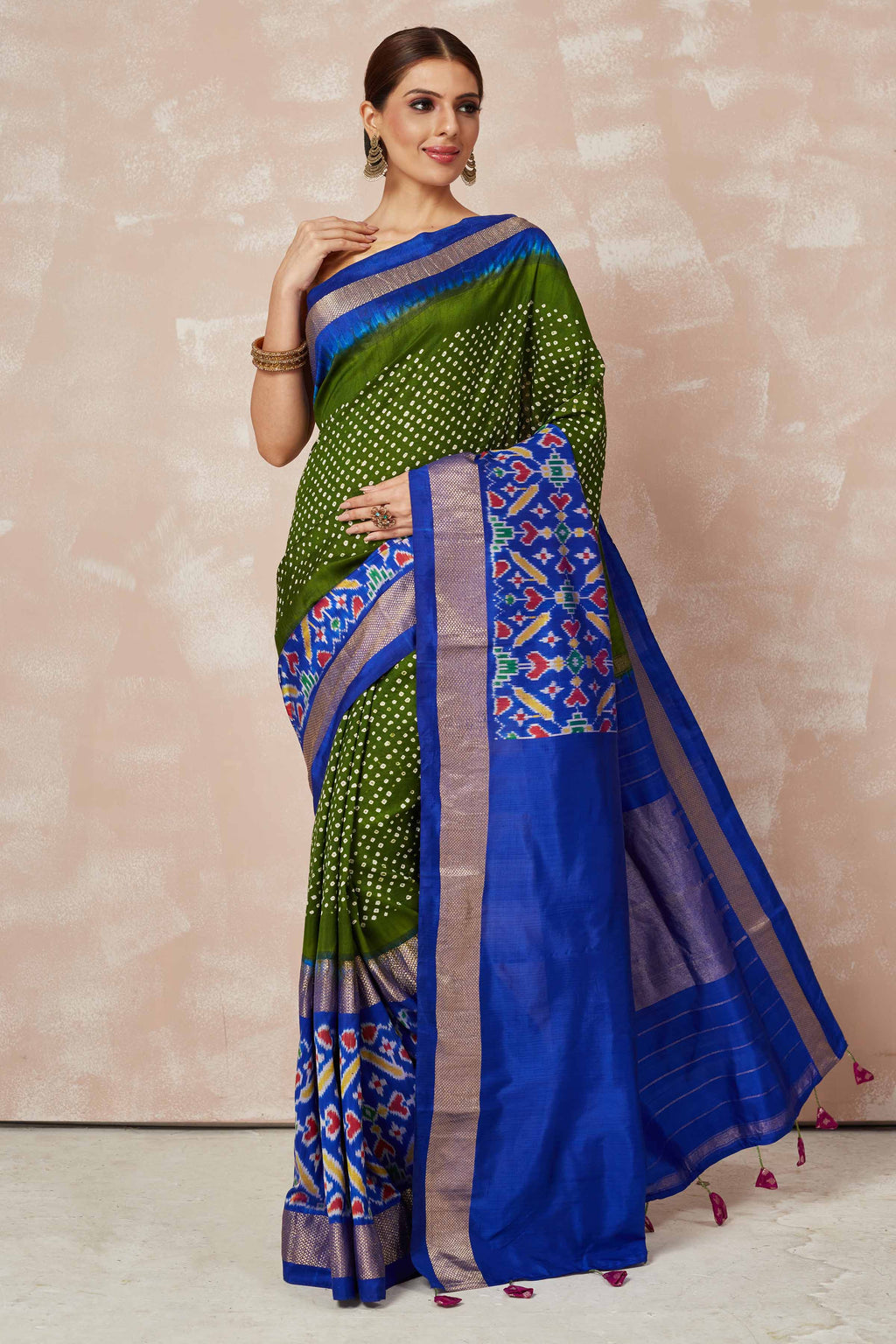 Buy mehendi green bandhej sari online in USA with blue ikkat zari border and pallu. Look your best on festive occasions in latest designer sarees, pure silk sarees, Kanjivaram silk saris, handwoven saris, tussar silk sarees, embroidered saris from Pure Elegance Indian clothing store in USA.-full view