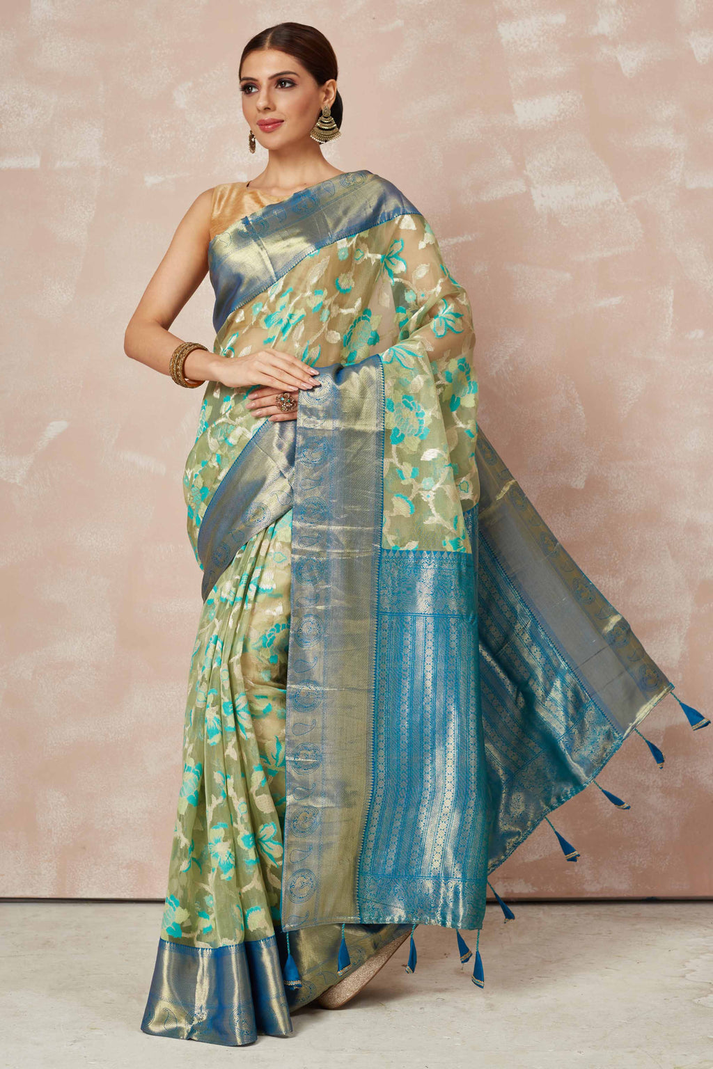 Buy beige brocade Kanchipuram saree online in USA with blue zari border and pallu. Look your best on festive occasions in latest designer sarees, pure silk sarees, Kanjivaram silk saris, handwoven saris, tussar silk sarees, embroidered saris from Pure Elegance Indian clothing store in USA.-full view