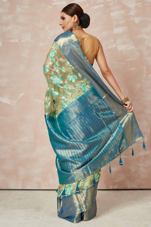 Buy beige brocade Kanchipuram saree online in USA with blue zari border and pallu. Look your best on festive occasions in latest designer sarees, pure silk sarees, Kanjivaram silk saris, handwoven saris, tussar silk sarees, embroidered saris from Pure Elegance Indian clothing store in USA.-back