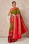 Shop olive green bandhej saree online in USA with red ikkat zari border and pallu. Look your best on festive occasions in latest designer sarees, pure silk sarees, Kanjivaram silk saris, handwoven saris, tussar silk sarees, embroidered saris from Pure Elegance Indian clothing store in USA.-full view