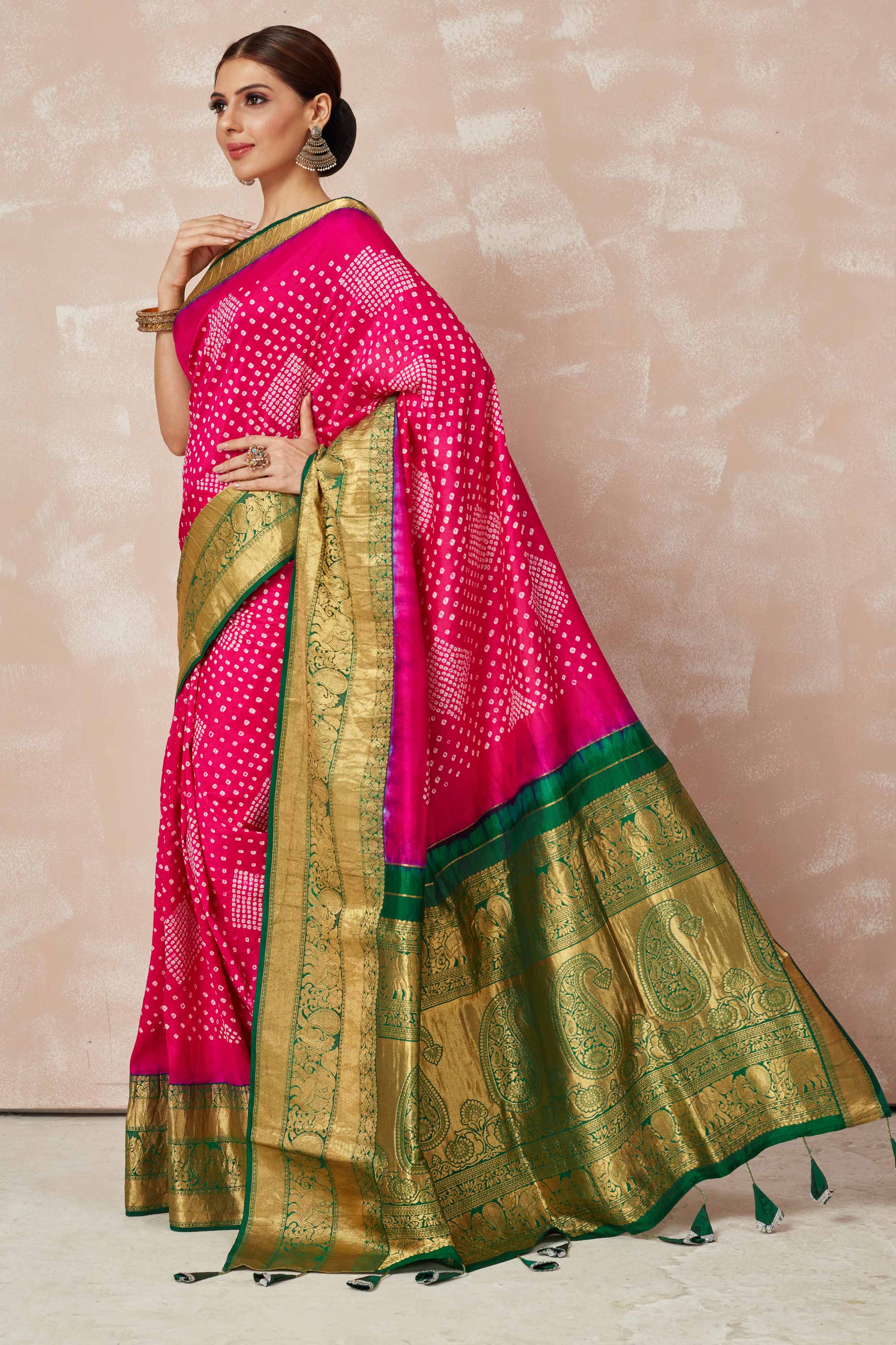 Shop pink bandhej saree online in USA with green zari border and pallu. Look your best on festive occasions in latest designer sarees, pure silk sarees, Kanjivaram silk saris, handwoven saris, tussar silk sarees, embroidered saris from Pure Elegance Indian clothing store in USA.-pallu