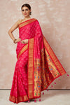 Shop pink bandhej saree online in USA with zari border and pallu. Look your best on festive occasions in latest designer sarees, pure silk sarees, Kanjivaram silk saris, handwoven saris, tussar silk sarees, embroidered saris from Pure Elegance Indian clothing store in USA.-full view