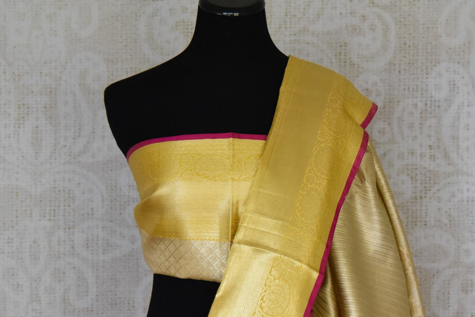 Shop cream Kanjivaram silk saree online in USA with golden zari border. Look your best on festive occasions in latest designer sarees, pure silk sarees, Kanjivaram silk saris, handwoven saris, tussar silk sarees, embroidered saris from Pure Elegance Indian clothing store in USA.-blouse