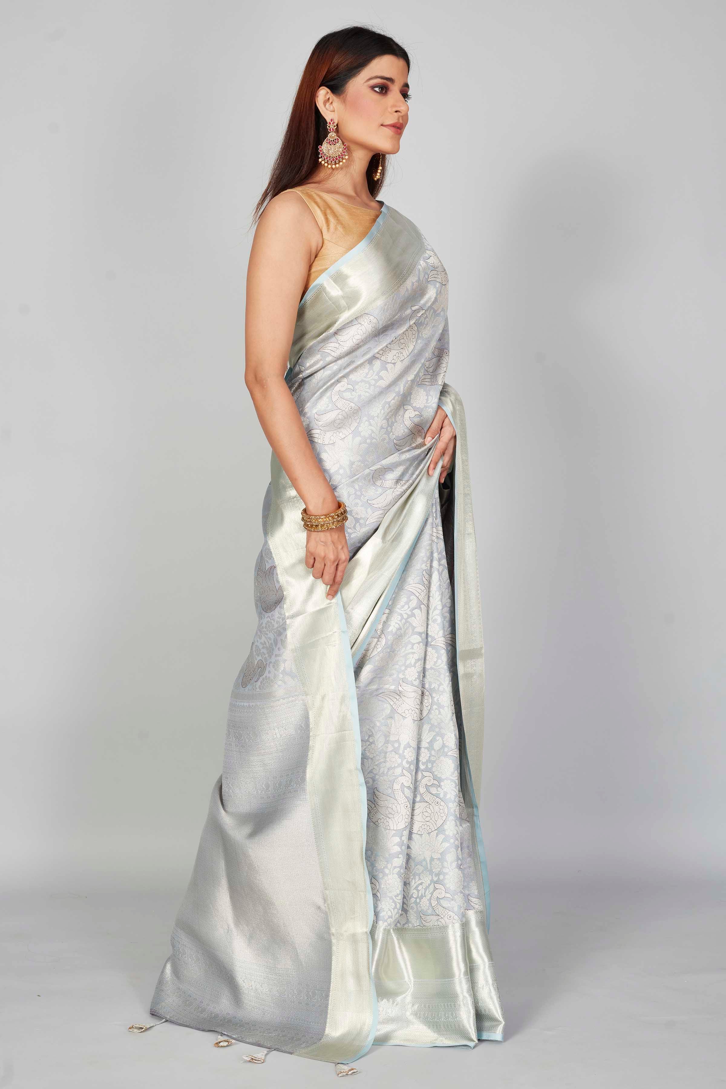 Shop beautiful powder blue Kanjeevaram silk sari online in USA with overall zari jaal. Look your best on festive occasions in latest designer saris, pure silk saris, Kanjivaram silk sarees, handwoven saris, tussar silk sarees, embroidered saris from Pure Elegance Indian clothing store in USA.-side