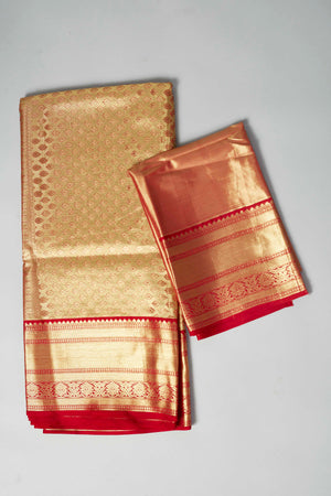 Buy pastel green Kanjeevaram silk sari online in USA with red zari border. Look your best on festive occasions in latest designer saris, pure silk saris, Kanjivaram silk sarees, handwoven saris, tussar silk sarees, embroidered saris from Pure Elegance Indian clothing store in USA.-blouse