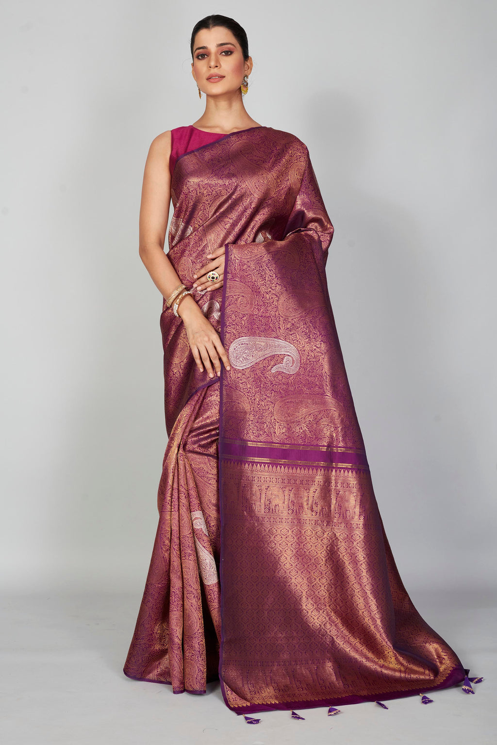 Shop purple zari Kanchipuram silk saree online in USA with silver paisley motifs. Look your best on festive occasions in latest designer saris, pure silk saris, Kanjivaram silk sarees, handwoven saris, tussar silk sarees, embroidered sarees from Pure Elegance Indian clothing store in USA.-full view