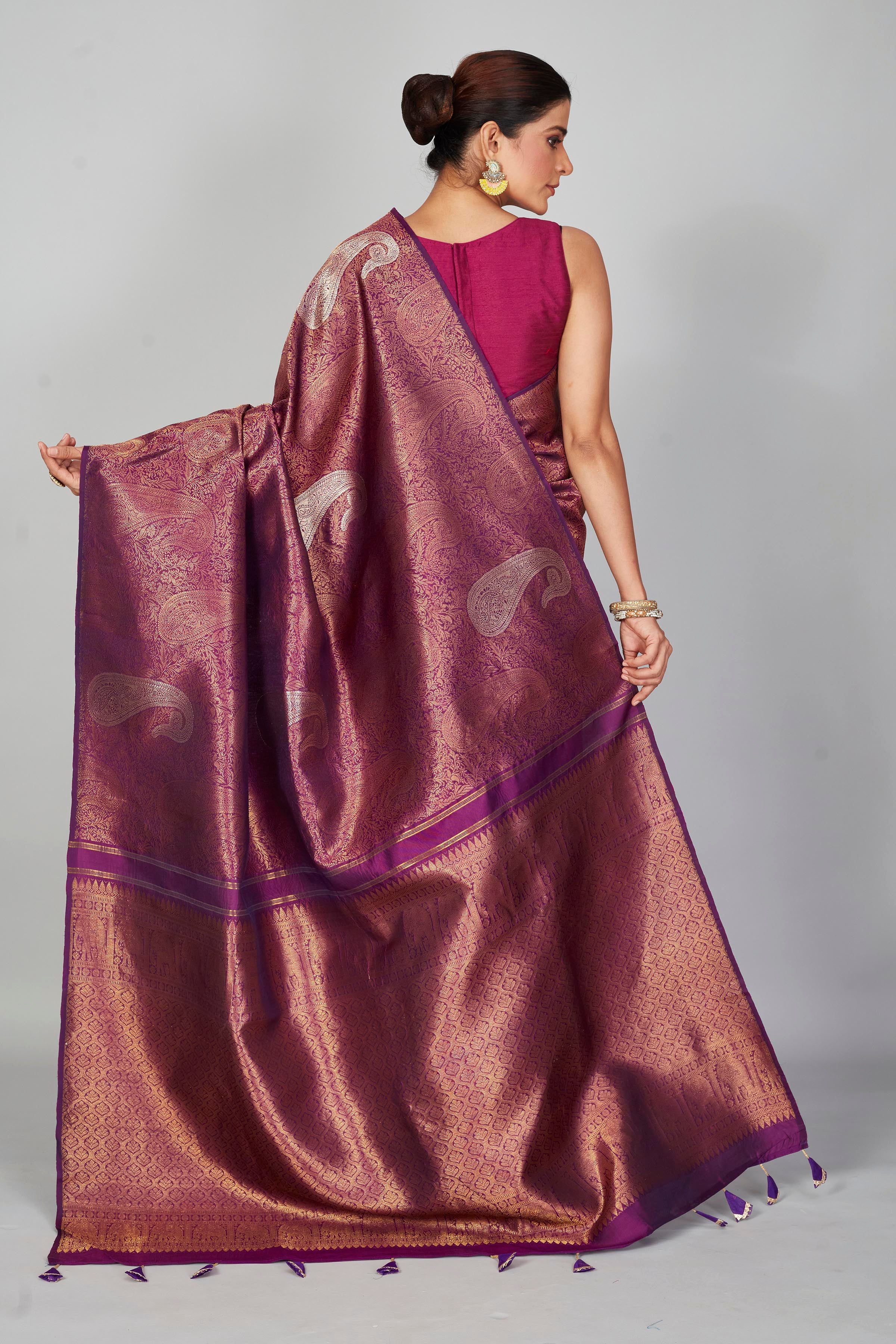 Shop purple zari Kanchipuram silk saree online in USA with silver paisley motifs. Look your best on festive occasions in latest designer saris, pure silk saris, Kanjivaram silk sarees, handwoven saris, tussar silk sarees, embroidered sarees from Pure Elegance Indian clothing store in USA.-back