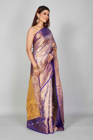 Shop purple heavy Kanchipuram silk sari online in USA with golden zari pallu. Look your best on festive occasions in latest designer saris, pure silk saris, Kanjivaram silk sarees, handwoven saris, tussar silk sarees, embroidered sarees from Pure Elegance Indian clothing store in USA.-side