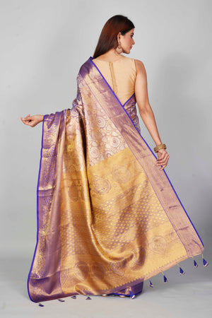 Shop purple heavy Kanchipuram silk sari online in USA with golden zari pallu. Look your best on festive occasions in latest designer saris, pure silk saris, Kanjivaram silk sarees, handwoven saris, tussar silk sarees, embroidered sarees from Pure Elegance Indian clothing store in USA.-back