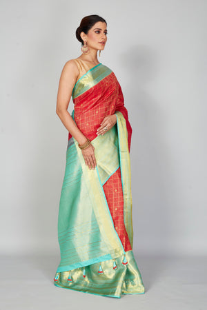 Buy red zari check Kanchipuram silk sari online in USA with blue zari border. Look your best on festive occasions in latest designer saris, pure silk saris, Kanjivaram silk sarees, handwoven saris, tussar silk sarees, embroidered sarees from Pure Elegance Indian clothing store in USA.-side