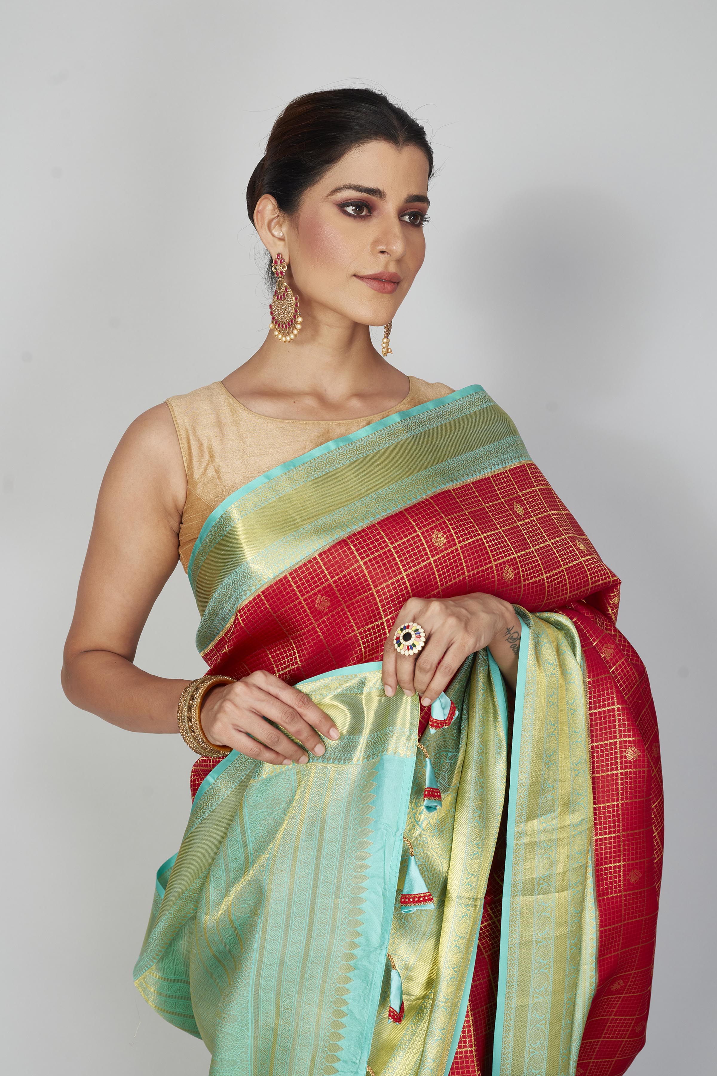 Buy red zari check Kanchipuram silk sari online in USA with blue zari border. Look your best on festive occasions in latest designer saris, pure silk saris, Kanjivaram silk sarees, handwoven saris, tussar silk sarees, embroidered sarees from Pure Elegance Indian clothing store in USA.-closeup