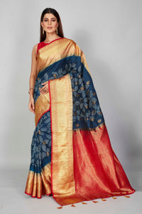 Buy dark blue silk Bandhej sari online in USA with red zari border. Look your best on festive occasions in latest designer saris, pure silk saris, Kanjivaram silk sarees, handwoven saris, tussar silk sarees, embroidered sarees from Pure Elegance Indian clothing store in USA.-full view