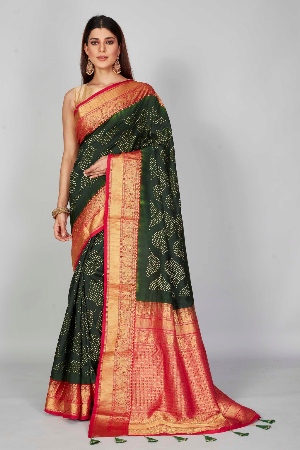 Buy dark green silk Bandhej sari online in USA with pink zari border. Look your best on festive occasions in latest designer saris, pure silk saris, Kanjivaram silk sarees, handwoven saris, tussar silk sarees, embroidered sarees from Pure Elegance Indian clothing store in USA.-full view