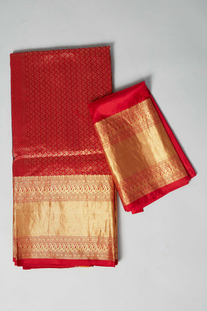 Buy dark green silk Bandhej saree online in USA with red zari border. Look your best on festive occasions in latest designer saris, pure silk saris, Kanjivaram silk sarees, handwoven saris, tussar silk sarees, embroidered sarees from Pure Elegance Indian clothing store in USA.-blouse