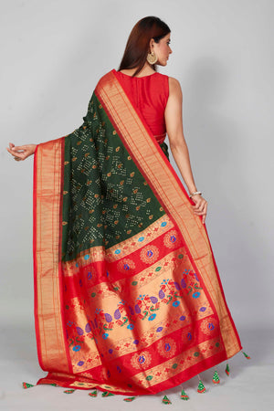 Buy dark green silk Bandhej saree online in USA with red zari border. Look your best on festive occasions in latest designer saris, pure silk saris, Kanjivaram silk sarees, handwoven saris, tussar silk sarees, embroidered sarees from Pure Elegance Indian clothing store in USA.-back