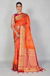 Buy beautiful orange Bandhej silk saree online in USA with red zari border. Look your best on festive occasions in latest designer saris, pure silk saris, Kanjivaram silk sarees, handwoven saris, tussar silk sarees, embroidered sarees from Pure Elegance Indian clothing store in USA.-full view