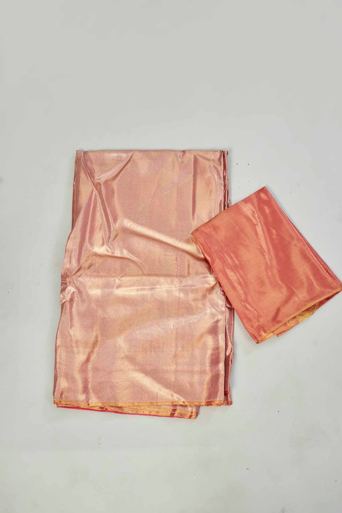 Buy beautiful orange tissue silk saree online in USA. Look your best on festive occasions in latest designer saris, pure silk saris, tissue silk sarees, handwoven saris, tussar silk sarees, linen sarees,  summer sarees from Pure Elegance Indian clothing store in USA.-blouse