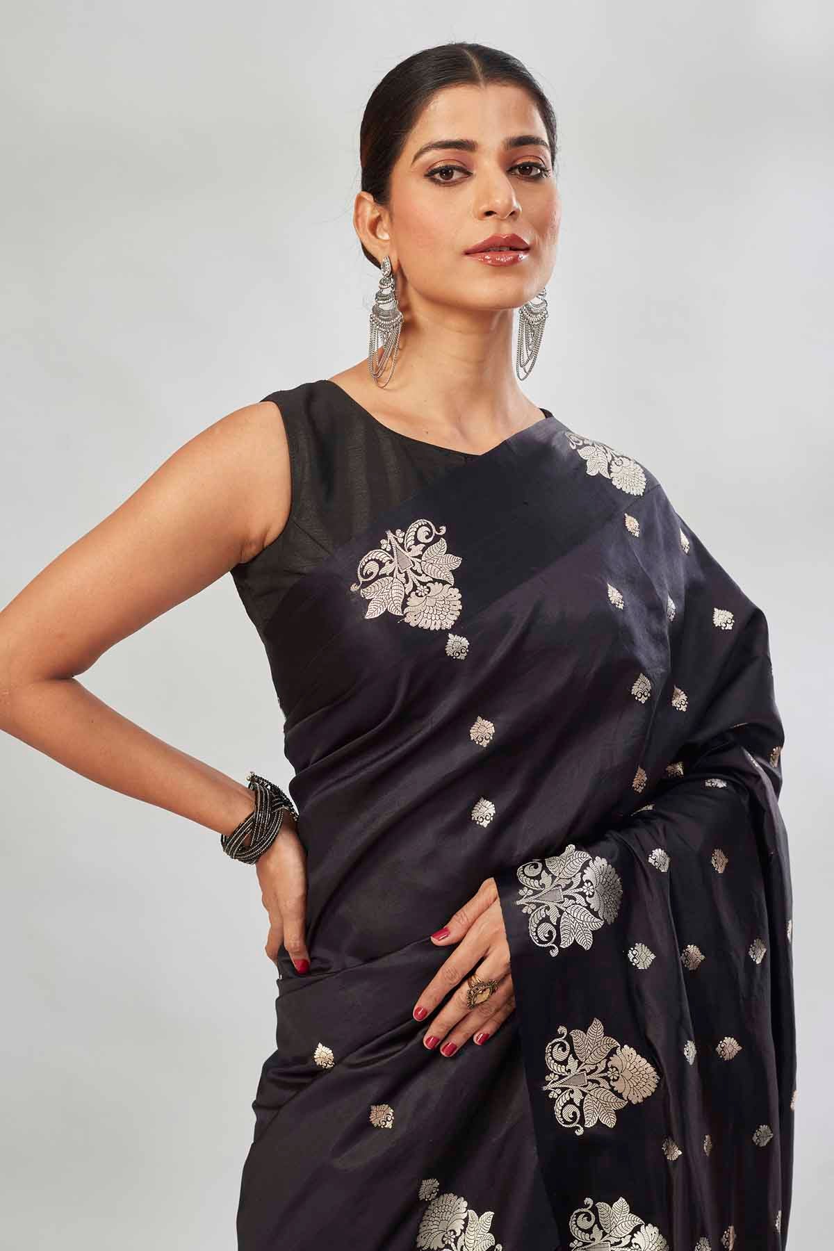 Buy black Mashru silk saree online in USA with silver zari buti and pallu. Look your best on festive occasions in latest designer saris, pure silk saris, tissue silk sarees, handwoven saris, tussar silk sarees, linen sarees,  summer sarees from Pure Elegance Indian clothing store in USA.-closeup