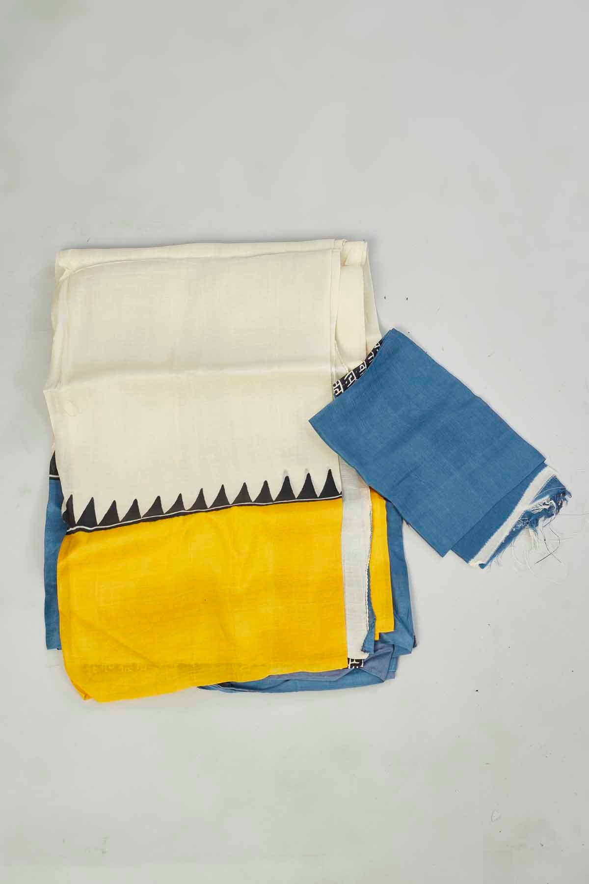 Buy cream batik print saree online in USA with yellow and blue border. Look your best on festive occasions in latest designer saris, pure silk saris, tissue silk sarees, handwoven saris, tussar silk sarees, linen sarees,  summer sarees from Pure Elegance Indian clothing store in USA.-blouse