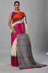 Buy cream batik print saree online in USA with orange and pink border. Look your best on festive occasions in latest designer saris, pure silk saris, tissue silk sarees, handwoven saris, tussar silk sarees, linen sarees,  summer sarees from Pure Elegance Indian clothing store in USA.-full view