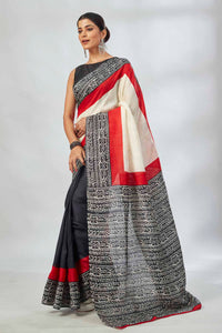 Shop elegant off-white and red black batik print saree online in USA. Look your best on festive occasions in latest designer saris, pure silk saris, tissue silk sarees, handwoven saris, tussar silk sarees, linen sarees,  summer sarees from Pure Elegance Indian clothing store in USA.-full view