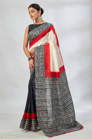 Shop elegant off-white and red black batik print saree online in USA. Look your best on festive occasions in latest designer saris, pure silk saris, tissue silk sarees, handwoven saris, tussar silk sarees, linen sarees,  summer sarees from Pure Elegance Indian clothing store in USA.-pallu