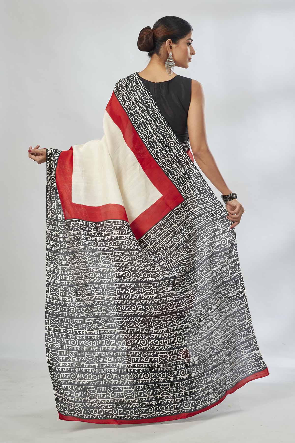 Shop elegant off-white and red black batik print saree online in USA. Look your best on festive occasions in latest designer saris, pure silk saris, tissue silk sarees, handwoven saris, tussar silk sarees, linen sarees,  summer sarees from Pure Elegance Indian clothing store in USA.-back