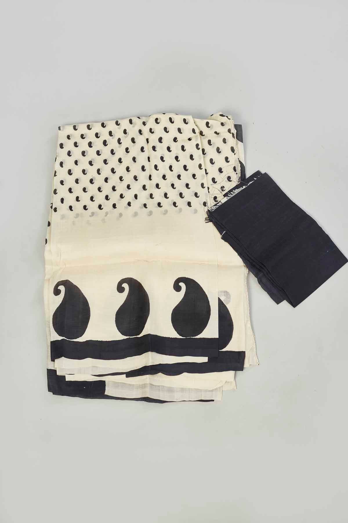 Shop elegant white batik print saree online in USA. Look your best on festive occasions in latest designer saris, pure silk saris, tissue silk sarees, handwoven saris, tussar silk sarees, linen sarees,  summer sarees from Pure Elegance Indian clothing store in USA.-blouse