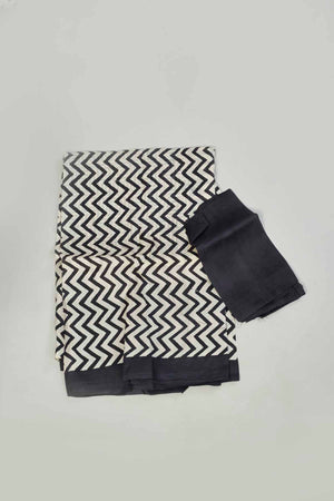 Buy white and black batik print saree online in USA. Look your best on festive occasions in latest designer saris, pure silk saris, tissue silk sarees, handwoven saris, tussar silk sarees, linen sarees,  summer sarees from Pure Elegance Indian clothing store in USA.-blouse