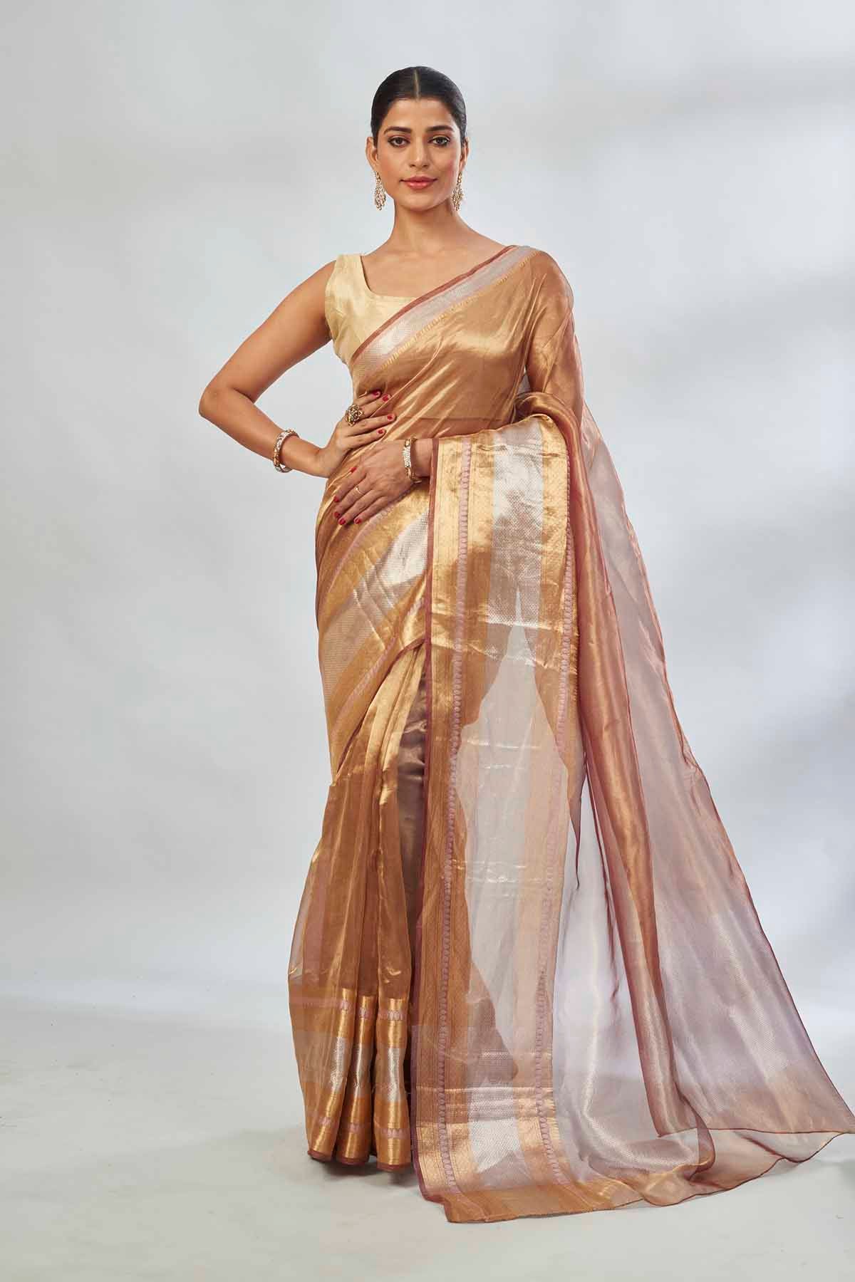 Shop golden tissue silk sari online in USA with silver stripes. Look your best on festive occasions in latest designer saris, pure silk saris, tissue silk sarees, handwoven saris, tussar silk sarees, linen sarees,  summer sarees from Pure Elegance Indian clothing store in USA.-full view