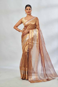 Shop golden tissue silk sari online in USA with silver stripes. Look your best on festive occasions in latest designer saris, pure silk saris, tissue silk sarees, handwoven saris, tussar silk sarees, linen sarees,  summer sarees from Pure Elegance Indian clothing store in USA.-full view