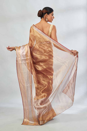 Shop golden tissue silk sari online in USA with silver stripes. Look your best on festive occasions in latest designer saris, pure silk saris, tissue silk sarees, handwoven saris, tussar silk sarees, linen sarees,  summer sarees from Pure Elegance Indian clothing store in USA.-back