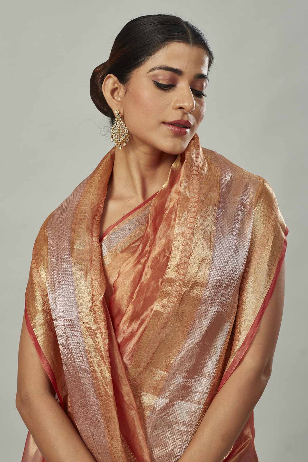 Shop beautiful golden and silver tissue silk saree online in USA. Look your best on festive occasions in latest designer saris, pure silk saris, tissue silk sarees, handwoven saris, tussar silk sarees, linen sarees,  summer sarees from Pure Elegance Indian clothing store in USA.-closeup