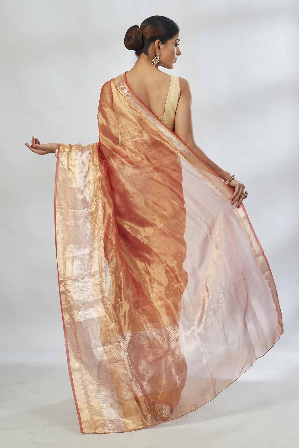 Shop beautiful golden and silver tissue silk saree online in USA. Look your best on festive occasions in latest designer saris, pure silk saris, tissue silk sarees, handwoven saris, tussar silk sarees, linen sarees,  summer sarees from Pure Elegance Indian clothing store in USA.-back