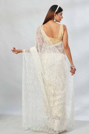Shop off-white sequin work net sari online in USA. Look your best on festive occasions in latest designer saris, pure silk saris, Kanjivaram silk sarees, handwoven saris, silk sarees, linen sarees,  embroidered sarees from Pure Elegance Indian clothing store in USA.- back