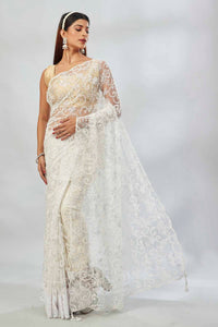 Buy off-white embroidered designer net sari online in USA. Look your best on festive occasions in latest designer saris, pure silk saris, Kanjivaram silk sarees, handwoven saris, silk sarees, linen sarees,  embroidered sarees from Pure Elegance Indian clothing store in USA.-full view