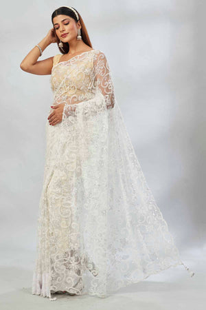 Buy off-white embroidered designer net sari online in USA. Look your best on festive occasions in latest designer saris, pure silk saris, Kanjivaram silk sarees, handwoven saris, silk sarees, linen sarees,  embroidered sarees from Pure Elegance Indian clothing store in USA.-pallu