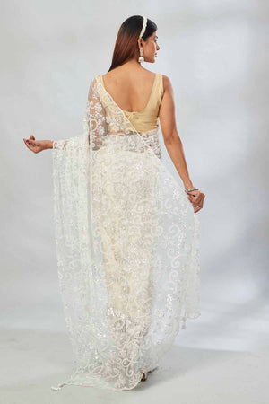 Buy off-white embroidered designer net sari online in USA. Look your best on festive occasions in latest designer saris, pure silk saris, Kanjivaram silk sarees, handwoven saris, silk sarees, linen sarees,  embroidered sarees from Pure Elegance Indian clothing store in USA.-back